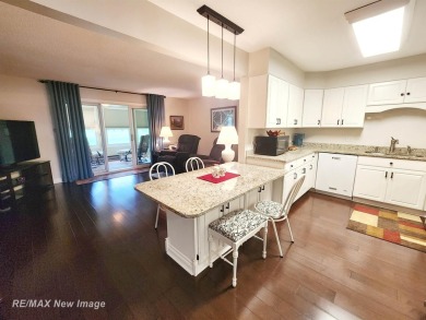 ** Best offer Due By 5/31 at 7 pm * Stunning executive condo on on Swan Valley Golf Club in Michigan - for sale on GolfHomes.com, golf home, golf lot
