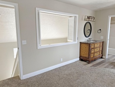 This beautiful condo offers vaulted ceilings, large kitchen and on St. George Golf Course in Utah - for sale on GolfHomes.com, golf home, golf lot