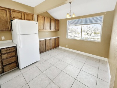 This beautiful condo offers vaulted ceilings, large kitchen and on St. George Golf Course in Utah - for sale on GolfHomes.com, golf home, golf lot
