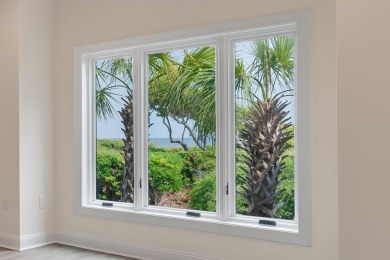 Discover an extraordinary coastal retreat in this beautifully on Kiawah Island Resort - Cougar Point in South Carolina - for sale on GolfHomes.com, golf home, golf lot