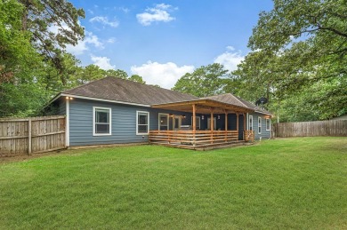 Nestled within the serene landscapes of Rayburn Country Resort on Rayburn Country Club in Texas - for sale on GolfHomes.com, golf home, golf lot