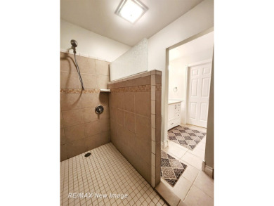 ** Best offer Due By 5/31 at 7 pm * Stunning executive condo on on Swan Valley Golf Club in Michigan - for sale on GolfHomes.com, golf home, golf lot