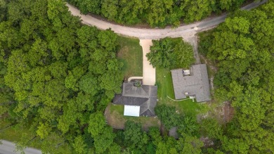 Nestled within the serene landscapes of Rayburn Country Resort on Rayburn Country Club in Texas - for sale on GolfHomes.com, golf home, golf lot