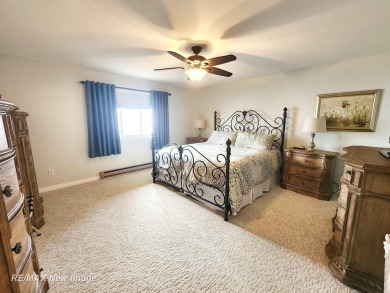 ** Best offer Due By 5/31 at 7 pm * Stunning executive condo on on Swan Valley Golf Club in Michigan - for sale on GolfHomes.com, golf home, golf lot