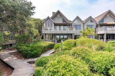 Discover an extraordinary coastal retreat in this beautifully on Kiawah Island Resort - Cougar Point in South Carolina - for sale on GolfHomes.com, golf home, golf lot