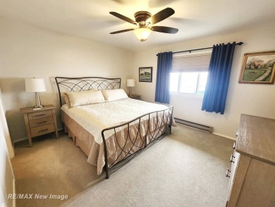 ** Best offer Due By 5/31 at 7 pm * Stunning executive condo on on Swan Valley Golf Club in Michigan - for sale on GolfHomes.com, golf home, golf lot