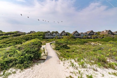 Discover an extraordinary coastal retreat in this beautifully on Kiawah Island Resort - Cougar Point in South Carolina - for sale on GolfHomes.com, golf home, golf lot
