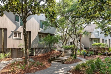 Discover an extraordinary coastal retreat in this beautifully on Kiawah Island Resort - Cougar Point in South Carolina - for sale on GolfHomes.com, golf home, golf lot