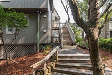 Discover an extraordinary coastal retreat in this beautifully on Kiawah Island Resort - Cougar Point in South Carolina - for sale on GolfHomes.com, golf home, golf lot