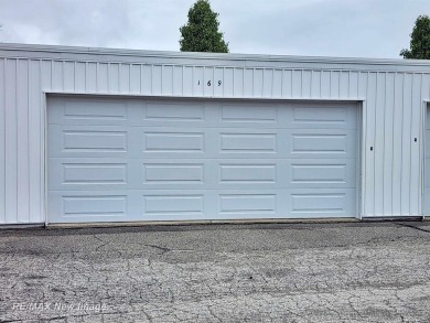 ** Best offer Due By 5/31 at 7 pm * Stunning executive condo on on Swan Valley Golf Club in Michigan - for sale on GolfHomes.com, golf home, golf lot