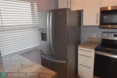 Retirement living at its finest! This stunning, updated 2/2 unit on Sunrise Lakes Phase IV Golf Course in Florida - for sale on GolfHomes.com, golf home, golf lot