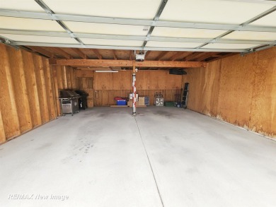 ** Best offer Due By 5/31 at 7 pm * Stunning executive condo on on Swan Valley Golf Club in Michigan - for sale on GolfHomes.com, golf home, golf lot