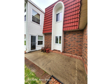 ** Best offer Due By 5/31 at 7 pm * Stunning executive condo on on Swan Valley Golf Club in Michigan - for sale on GolfHomes.com, golf home, golf lot