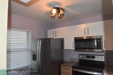 Retirement living at its finest! This stunning, updated 2/2 unit on Sunrise Lakes Phase IV Golf Course in Florida - for sale on GolfHomes.com, golf home, golf lot
