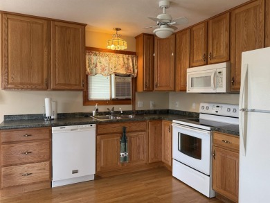 Welcome to your up north getaway! This charming 2-bedroom on Lakeside Golf Course in Michigan - for sale on GolfHomes.com, golf home, golf lot