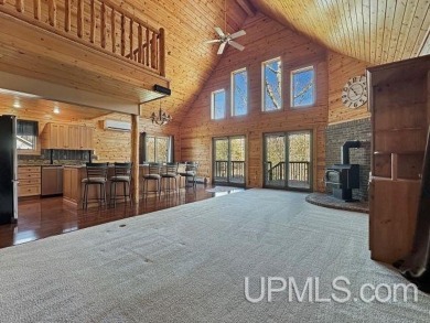 Custom-Built Rustic Retreat on Private Wooded Lot 3 Bed | 2 Bath on Irish Oaks Golf Course in Michigan - for sale on GolfHomes.com, golf home, golf lot