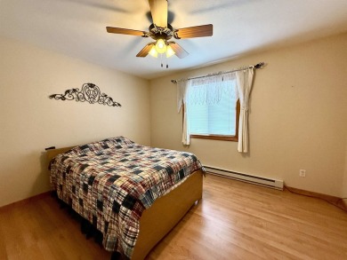 Welcome to your up north getaway! This charming 2-bedroom on Lakeside Golf Course in Michigan - for sale on GolfHomes.com, golf home, golf lot
