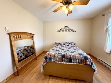 Welcome to your up north getaway! This charming 2-bedroom on Lakeside Golf Course in Michigan - for sale on GolfHomes.com, golf home, golf lot
