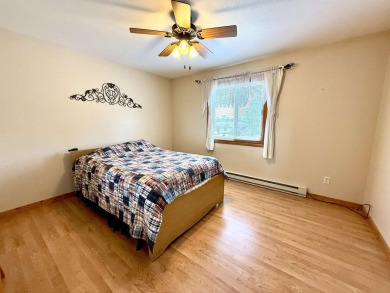 Welcome to your up north getaway! This charming 2-bedroom on Lakeside Golf Course in Michigan - for sale on GolfHomes.com, golf home, golf lot