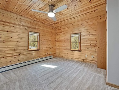 Custom-Built Rustic Retreat on Private Wooded Lot 3 Bed | 2 Bath on Irish Oaks Golf Course in Michigan - for sale on GolfHomes.com, golf home, golf lot