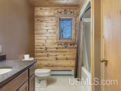 Custom-Built Rustic Retreat on Private Wooded Lot 3 Bed | 2 Bath on Irish Oaks Golf Course in Michigan - for sale on GolfHomes.com, golf home, golf lot