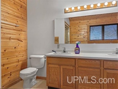 Custom-Built Rustic Retreat on Private Wooded Lot 3 Bed | 2 Bath on Irish Oaks Golf Course in Michigan - for sale on GolfHomes.com, golf home, golf lot
