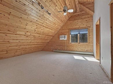 Custom-Built Rustic Retreat on Private Wooded Lot 3 Bed | 2 Bath on Irish Oaks Golf Course in Michigan - for sale on GolfHomes.com, golf home, golf lot