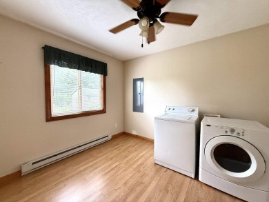 Welcome to your up north getaway! This charming 2-bedroom on Lakeside Golf Course in Michigan - for sale on GolfHomes.com, golf home, golf lot