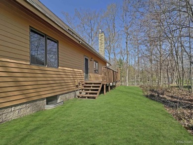 Custom-Built Rustic Retreat on Private Wooded Lot 3 Bed | 2 Bath on Irish Oaks Golf Course in Michigan - for sale on GolfHomes.com, golf home, golf lot