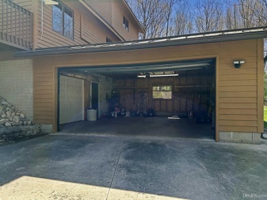 Custom-Built Rustic Retreat on Private Wooded Lot 3 Bed | 2 Bath on Irish Oaks Golf Course in Michigan - for sale on GolfHomes.com, golf home, golf lot