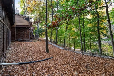 End unit on wooded lot with views of Kingsmill Pond. Sun room on Kingsmill Resort and Golf Club in Virginia - for sale on GolfHomes.com, golf home, golf lot