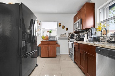 Welcome to this inviting 2 bedroom, 1 bathroom home in the heart on Lake Worth Municipal Golf Course in Florida - for sale on GolfHomes.com, golf home, golf lot