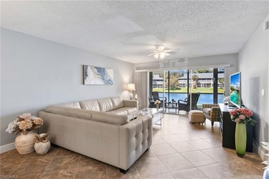 This beautifully updated lakefront residence is located in Abbey on Imperial Golf Club in Florida - for sale on GolfHomes.com, golf home, golf lot