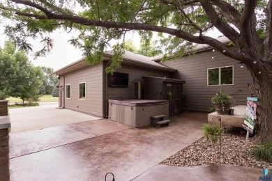 Come Tour this Beautiful 4 bed 4 bath home directly across the on Brandon Municipal Golf Course in South Dakota - for sale on GolfHomes.com, golf home, golf lot