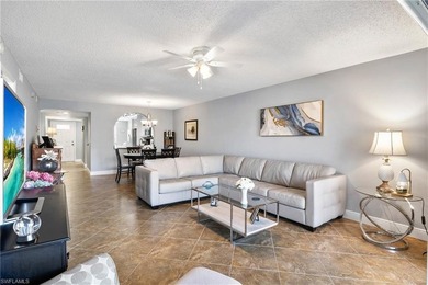 This beautifully updated lakefront residence is located in Abbey on Imperial Golf Club in Florida - for sale on GolfHomes.com, golf home, golf lot