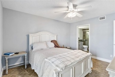 This beautifully updated lakefront residence is located in Abbey on Imperial Golf Club in Florida - for sale on GolfHomes.com, golf home, golf lot