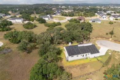 NEW LOWER PRICE - MOTIVATED SELLER! Perfect home for the empty on Vaaler Creek Golf Club in Texas - for sale on GolfHomes.com, golf home, golf lot