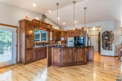 Come Tour this Beautiful 4 bed 4 bath home directly across the on Brandon Municipal Golf Course in South Dakota - for sale on GolfHomes.com, golf home, golf lot