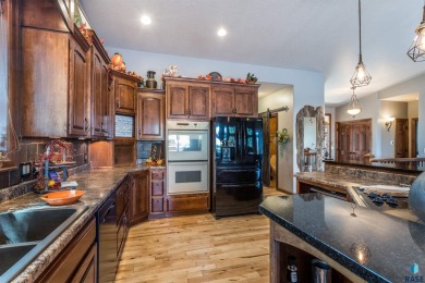 Come Tour this Beautiful 4 bed 4 bath home directly across the on Brandon Municipal Golf Course in South Dakota - for sale on GolfHomes.com, golf home, golf lot