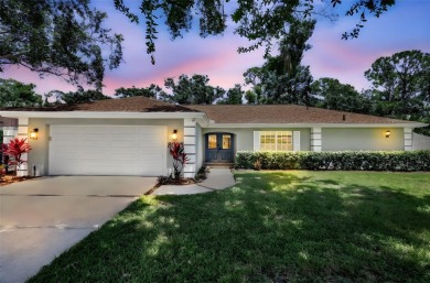 This beautifully maintained 3-bedroom, 2-bath pool home is on Palm Aire Country Club of Sarasota in Florida - for sale on GolfHomes.com, golf home, golf lot