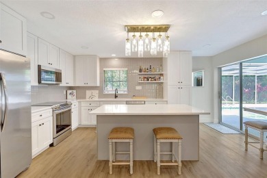 This beautifully maintained 3-bedroom, 2-bath pool home is on Palm Aire Country Club of Sarasota in Florida - for sale on GolfHomes.com, golf home, golf lot
