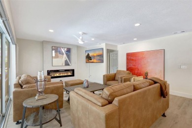 This beautifully maintained 3-bedroom, 2-bath pool home is on Palm Aire Country Club of Sarasota in Florida - for sale on GolfHomes.com, golf home, golf lot