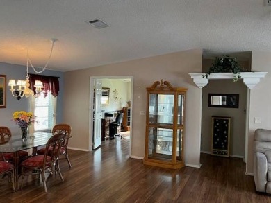 Step Inside This Exceptional Home: Your Dream Awaits!    Homes on Four Lakes Golf Club in Florida - for sale on GolfHomes.com, golf home, golf lot