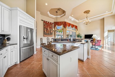 Exceptional courtyard estate perfectly positioned on a premium on  in Florida - for sale on GolfHomes.com, golf home, golf lot