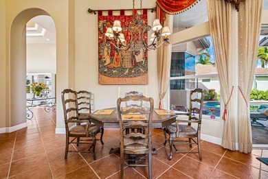 Exceptional courtyard estate perfectly positioned on a premium on  in Florida - for sale on GolfHomes.com, golf home, golf lot