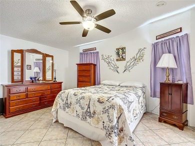 Step inside and feel at home instantly in this beautifully on Lily Lake Golf and RV Resort in Florida - for sale on GolfHomes.com, golf home, golf lot