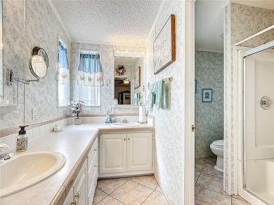 Step inside and feel at home instantly in this beautifully on Lily Lake Golf and RV Resort in Florida - for sale on GolfHomes.com, golf home, golf lot