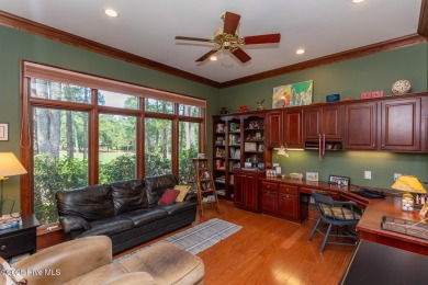 Experience elegant living in this stunning golf front home on Pinewild Country Club of Pinehurst in North Carolina - for sale on GolfHomes.com, golf home, golf lot