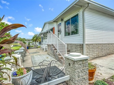 Step inside and feel at home instantly in this beautifully on Lily Lake Golf and RV Resort in Florida - for sale on GolfHomes.com, golf home, golf lot
