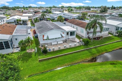 Step inside and feel at home instantly in this beautifully on Lily Lake Golf and RV Resort in Florida - for sale on GolfHomes.com, golf home, golf lot